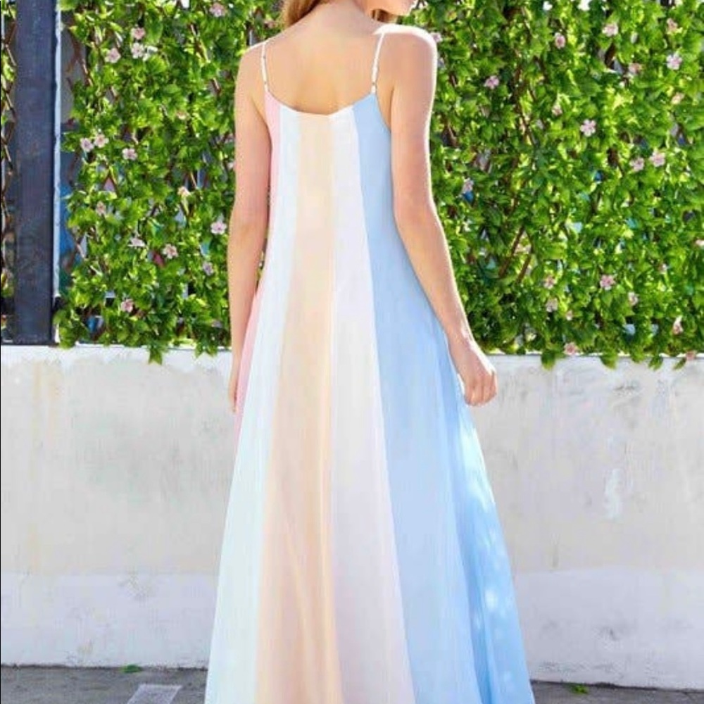 Maxi dress with adjustable spaghetti straps.